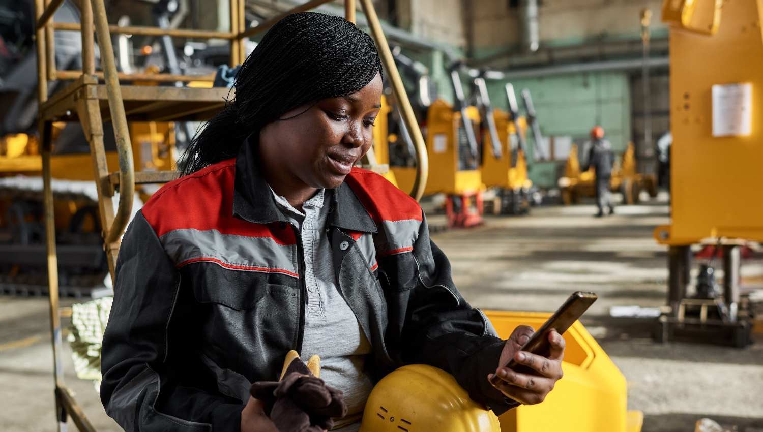 Engineer-checking-phone-messages