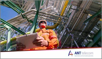 A worker carrying a tablet