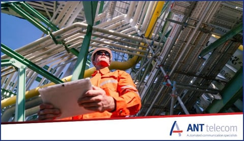 A worker carrying a tablet