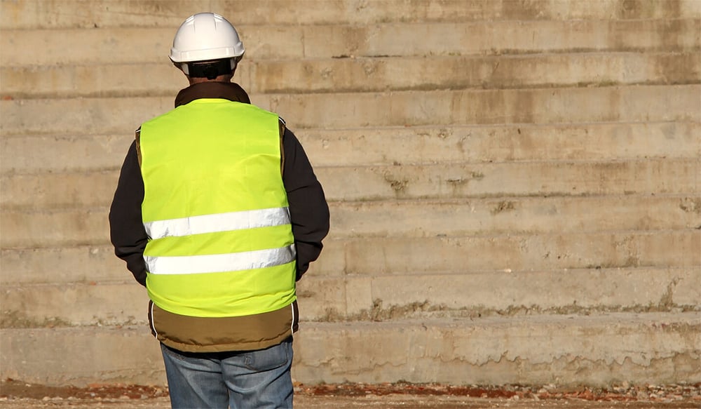 lone worker walking away