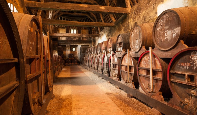 oak whisky barrels in storage