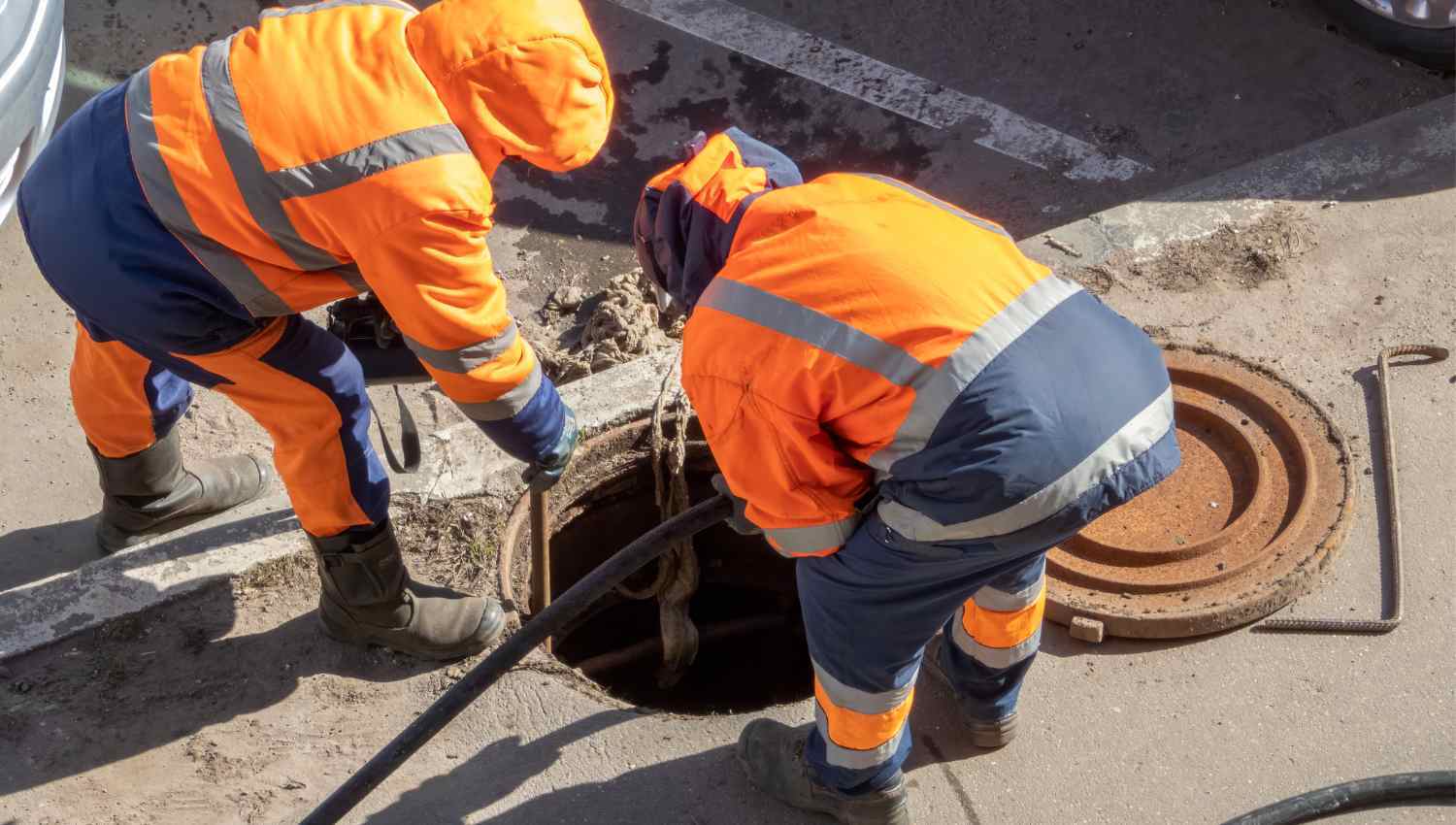 Utility workers checking for gas